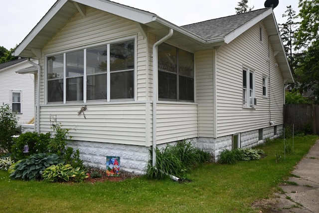2245 Morton Ave, Muskegon, MI 49441 - view of home's exterior featuring a shingled roof