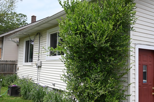 2245 Morton Ave, Muskegon, MI 49441 - view of property exterior with a chimney