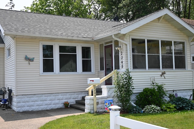 2245 Morton Ave, Muskegon, MI 49441 - bungalow featuring a shingled roof
