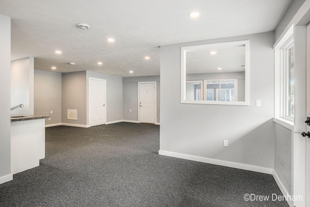 6973 W Blue Water Hwy, Saranac, MI 48881 - empty room with recessed lighting, a smoke detector, and dark colored carpet