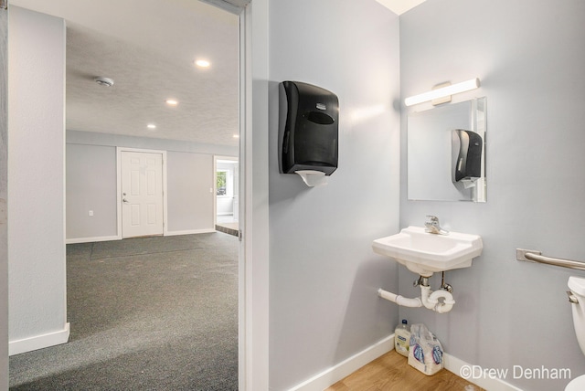 6973 W Blue Water Hwy, Saranac, MI 48881 - bathroom featuring toilet and recessed lighting