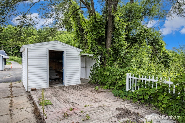 6973 W Blue Water Hwy, Saranac, MI 48881 - deck with a shed