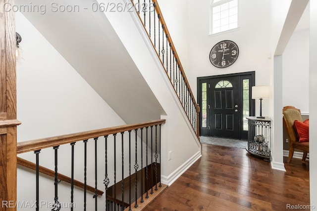 182 Fairhill Way, Howell, MI 48843 - entrance foyer featuring a towering ceiling, wood-type flooring, and stairs