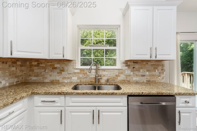182 Fairhill Way, Howell, MI 48843 - kitchen with dishwasher, white cabinets, backsplash, and plenty of natural light