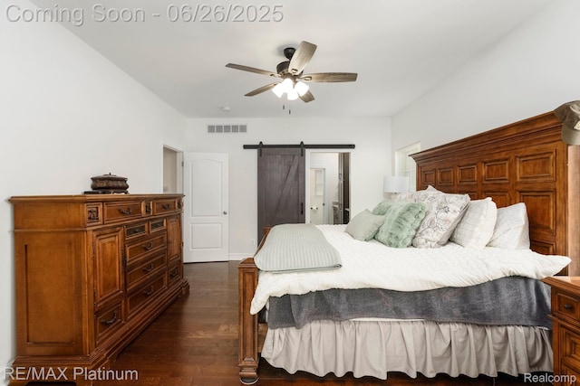 182 Fairhill Way, Howell, MI 48843 - bedroom featuring dark wood-type flooring, a barn door, ceiling fan, and ensuite bath