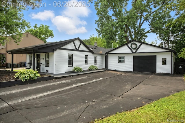 8411 Hugh St, Westland, MI 48185 - single story home with an attached garage and driveway