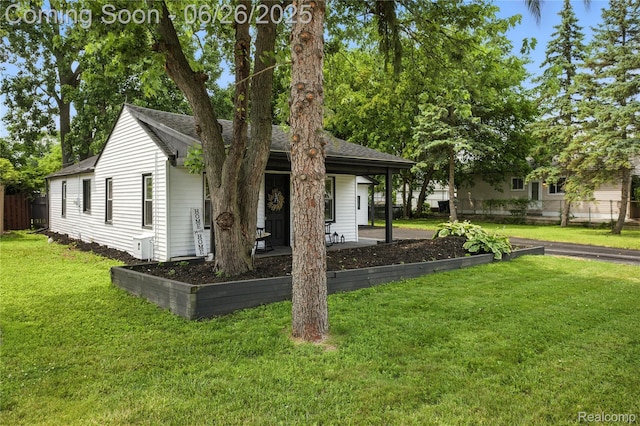 8411 Hugh St, Westland, MI 48185 - view of front of home featuring covered porch and roof with shingles