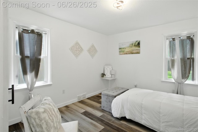 8411 Hugh St, Westland, MI 48185 - bedroom featuring wood finished floors and baseboards