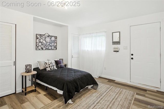 8411 Hugh St, Westland, MI 48185 - bedroom with wood finished floors and baseboards