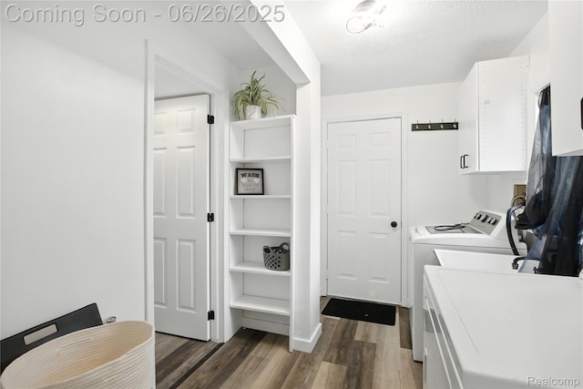 8411 Hugh St, Westland, MI 48185 - laundry room featuring cabinet space, separate washer and dryer, and wood finished floors