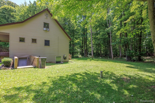 2931 N Lake Pleasant Rd, Attica, MI 48412 - view of home's exterior with a lawn and a view of trees