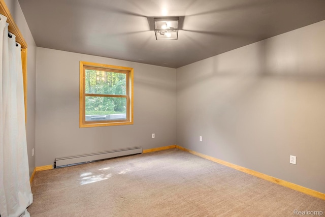2931 N Lake Pleasant Rd, Attica, MI 48412 - unfurnished room with a baseboard heating unit and carpet flooring