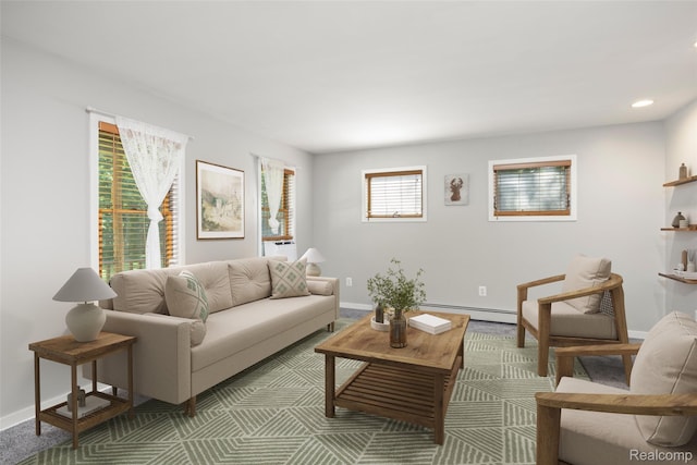 2931 N Lake Pleasant Rd, Attica, MI 48412 - living area with a baseboard heating unit and recessed lighting