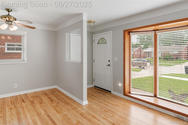 8639 Alper St, Westland, MI 48185 - entrance foyer with light wood-style flooring and a ceiling fan