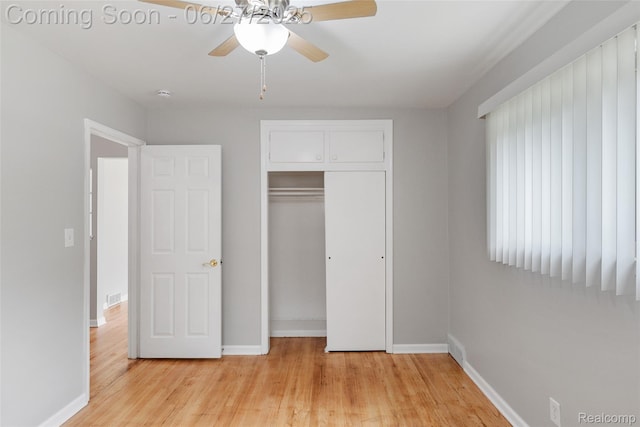 8639 Alper St, Westland, MI 48185 - unfurnished bedroom with light wood-style flooring, a closet, and ceiling fan
