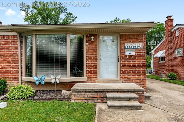8639 Alper St, Westland, MI 48185 - property entrance with brick siding