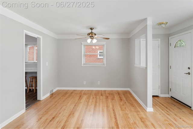 8639 Alper St, Westland, MI 48185 - foyer featuring plenty of natural light, light wood-style flooring, and ceiling fan