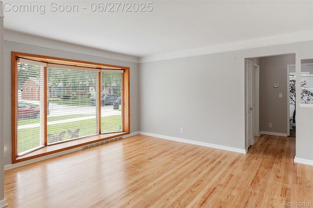 8639 Alper St, Westland, MI 48185 - spare room featuring light wood finished floors and baseboards