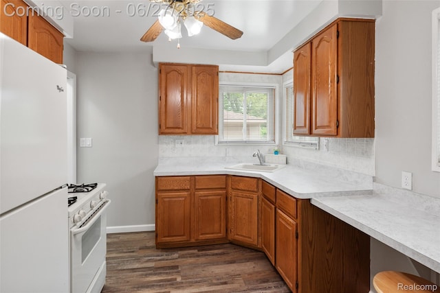 8639 Alper St, Westland, MI 48185 - kitchen with white appliances, ceiling fan, dark wood-style floors, and backsplash
