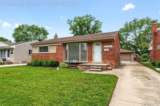 8639 Alper St, Westland, MI 48185 - view of front facade featuring brick siding, a front yard, a chimney, an outdoor structure, and a detached garage