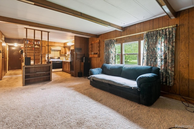 4800 S Huron Rd, Standish, MI 48658 - living room with beamed ceiling, wood walls, and light colored carpet