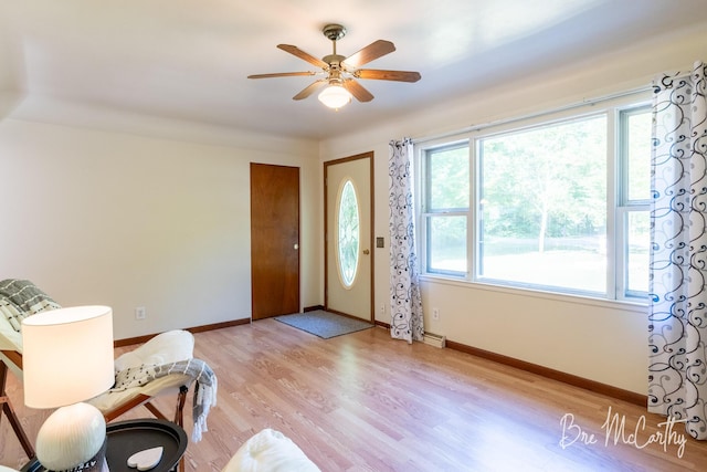 3541 Orshal Rd, Whitehall, MI 49461 - foyer entrance with a ceiling fan and light wood-style flooring