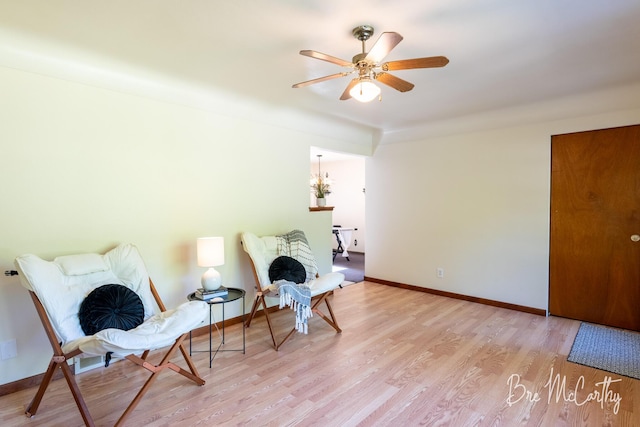3541 Orshal Rd, Whitehall, MI 49461 - living area with wood finished floors and ceiling fan
