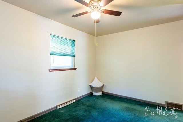 3541 Orshal Rd, Whitehall, MI 49461 - empty room with a ceiling fan, carpet floors, and a baseboard heating unit
