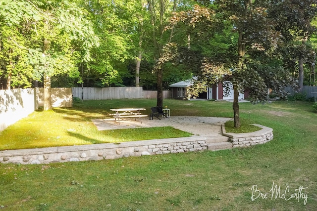3541 Orshal Rd, Whitehall, MI 49461 - view of yard featuring an outbuilding and a patio area