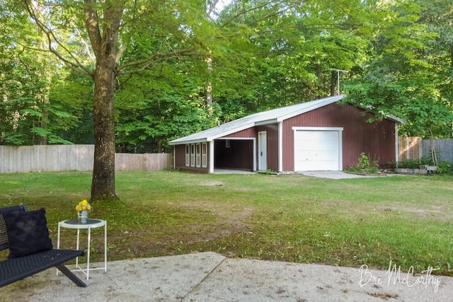 3541 Orshal Rd, Whitehall, MI 49461 - view of yard with a garage and an outbuilding