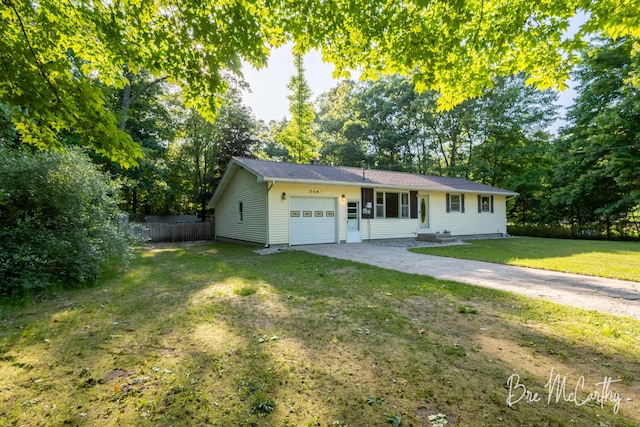 3541 Orshal Rd, Whitehall, MI 49461 - single story home with a garage and driveway