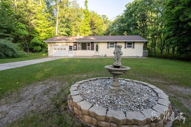3541 Orshal Rd, Whitehall, MI 49461 - single story home featuring an attached garage, a front yard, and concrete driveway
