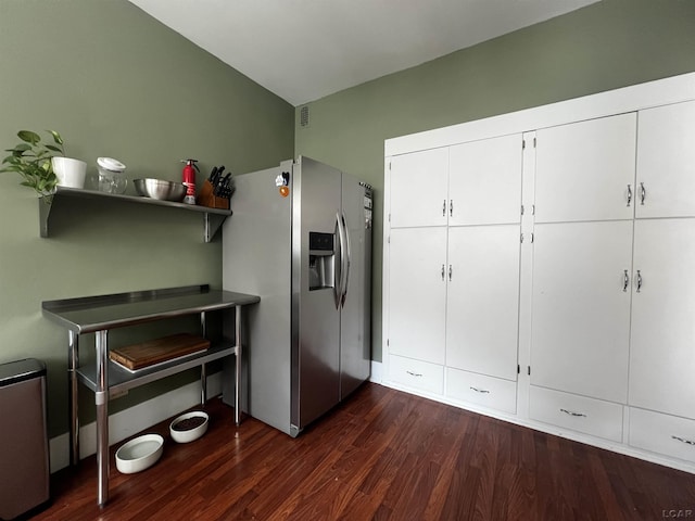 950 College Ave, Adrian, MI 49221 - kitchen featuring stainless steel fridge, dark wood-style floors, white cabinets, and open shelves