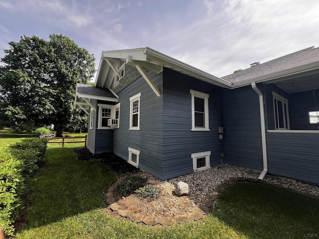 950 College Ave, Adrian, MI 49221 - view of property exterior featuring a lawn