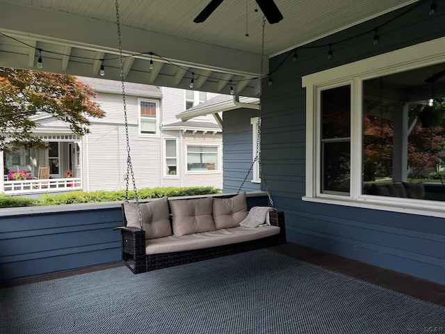 950 College Ave, Adrian, MI 49221 - deck featuring a ceiling fan, an outdoor hangout area, and a patio