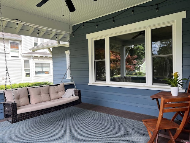 950 College Ave, Adrian, MI 49221 - wooden terrace with a ceiling fan, outdoor lounge area, and a patio