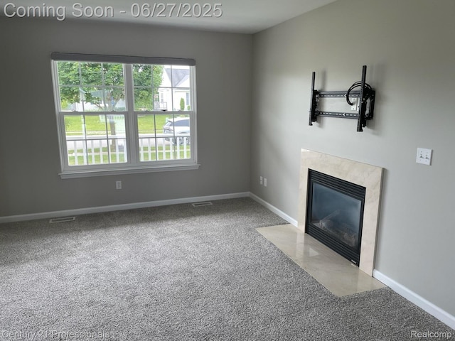 8090 Majestic Blvd, Fowlerville, MI 48836 - unfurnished living room with carpet and a fireplace