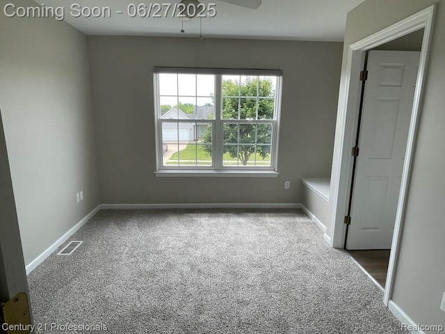 8090 Majestic Blvd, Fowlerville, MI 48836 - carpeted spare room with baseboards and ceiling fan