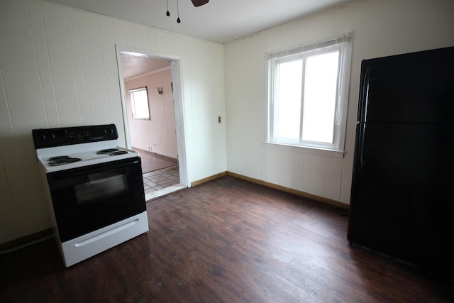 22779 Almond Ave, Eastpointe, MI 48021 - kitchen with freestanding refrigerator, electric range oven, dark wood-style floors, and a ceiling fan