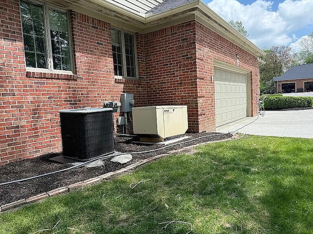 8255 Shady Brook Ln, Flushing, MI 48433 - exterior view of concrete driveway and brick siding
