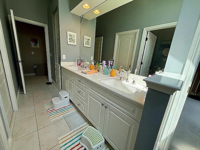 8255 Shady Brook Ln, Flushing, MI 48433 - bathroom with tile patterned floors and double vanity