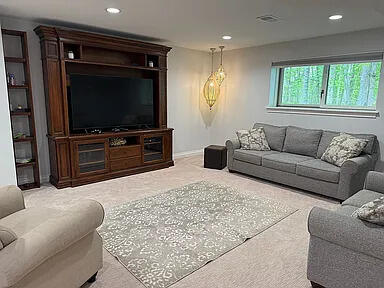 8255 Shady Brook Ln, Flushing, MI 48433 - living room with carpet floors and recessed lighting
