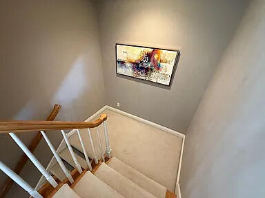 8255 Shady Brook Ln, Flushing, MI 48433 - stairs featuring baseboards