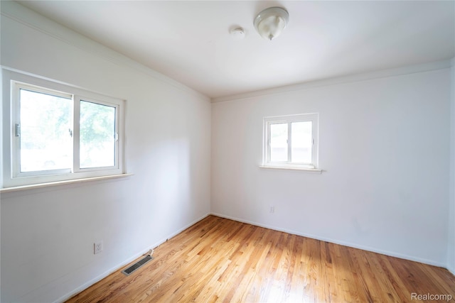 17213 Anne Ave, Detroit, MI 48101 - unfurnished room featuring wood finished floors and crown molding
