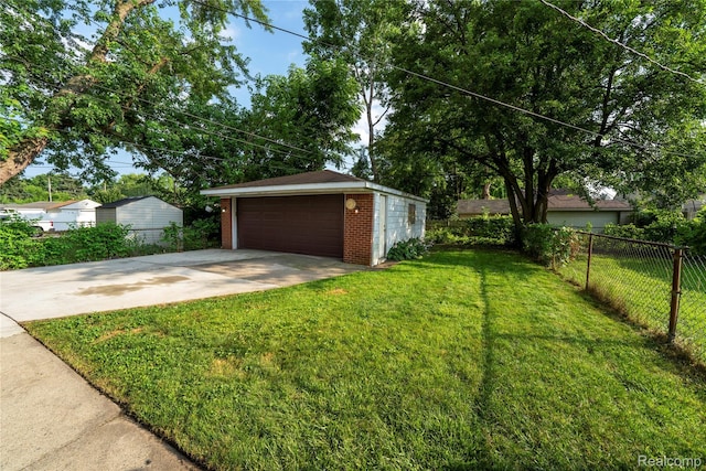 17213 Anne Ave, Detroit, MI 48101 - view of yard with an outdoor structure and a garage