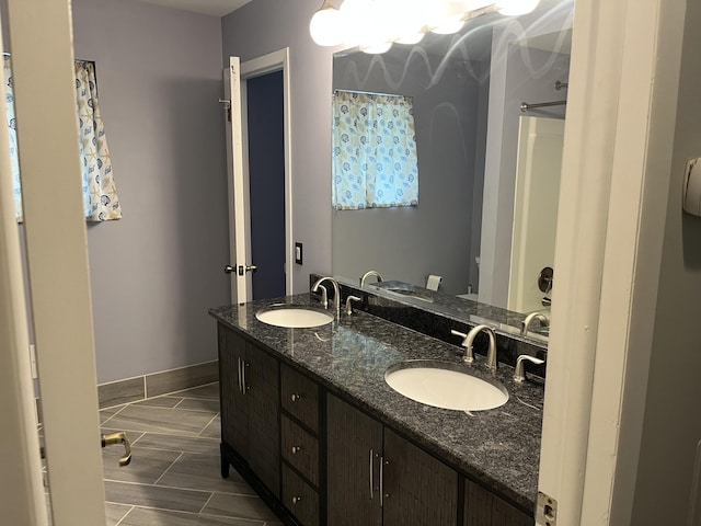 810 Oakgrove, Highland, MI 48356 - bathroom featuring double vanity and a shower with curtain