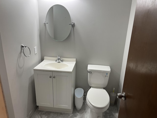 810 Oakgrove, Highland, MI 48356 - half bathroom with vanity and marble finish floors