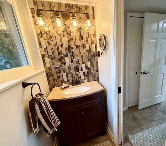 13955 Rattalee Lake Rd, Davisburg, MI 48350 - bathroom with vanity and decorative backsplash