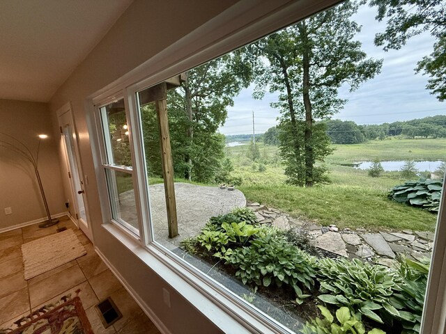 13955 Rattalee Lake Rd, Davisburg, MI 48350 - unfurnished sunroom featuring a water view