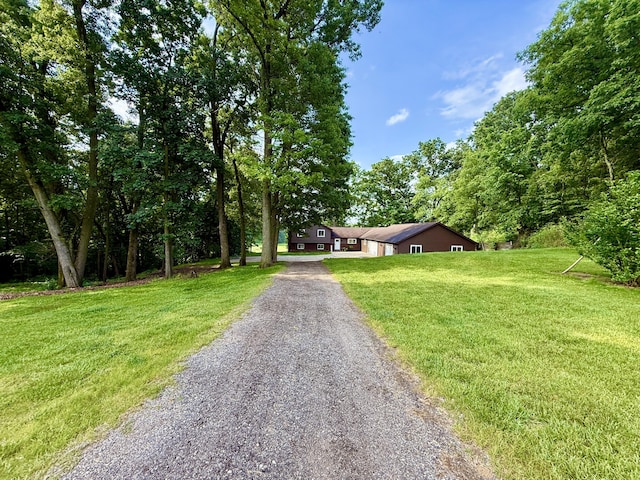 13955 Rattalee Lake Rd, Davisburg, MI 48350 - view of front facade with gravel driveway and a front yard